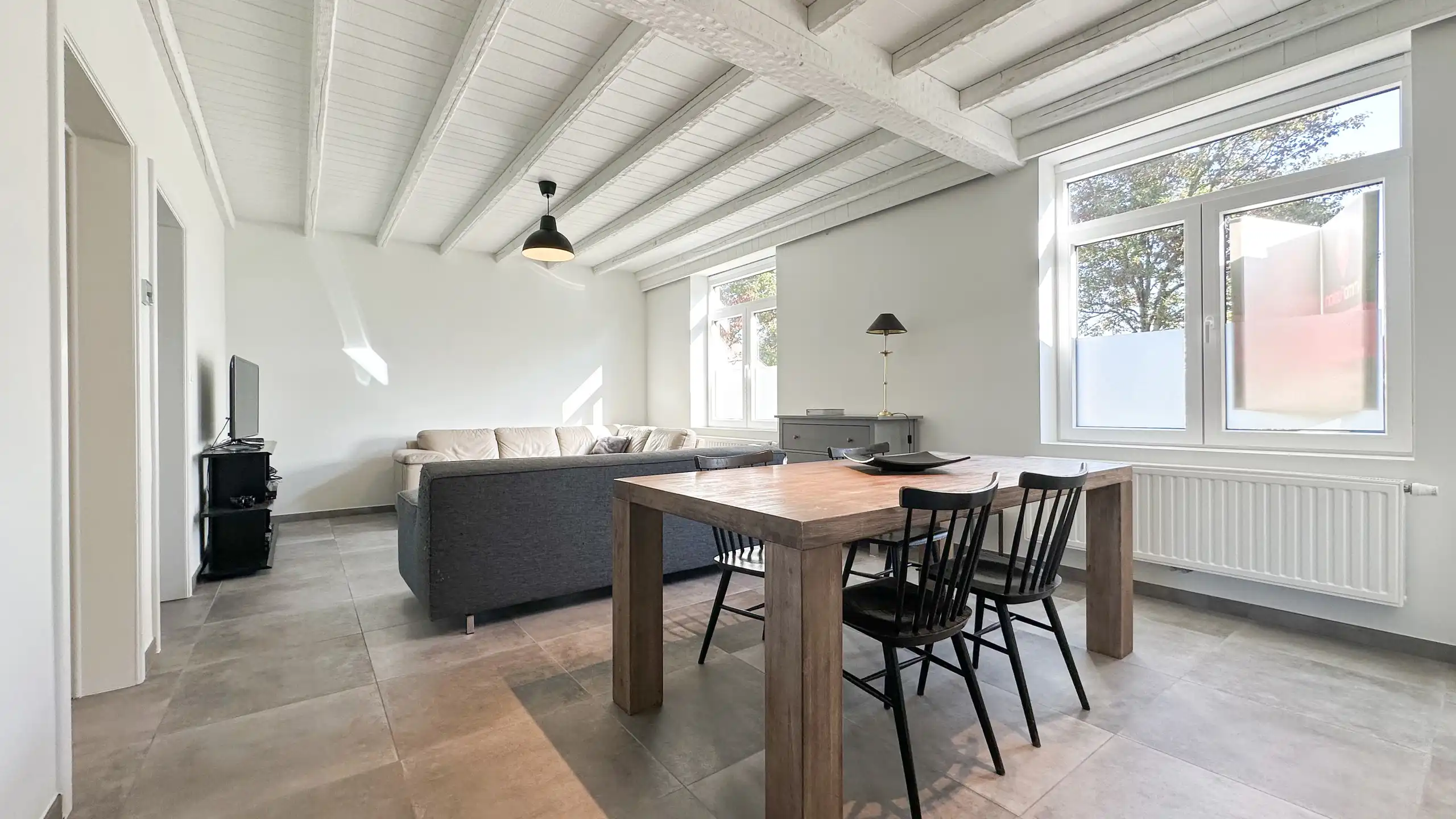 Charmante woning met 2 slaapkamers en een polyvalente ruimte foto 3
