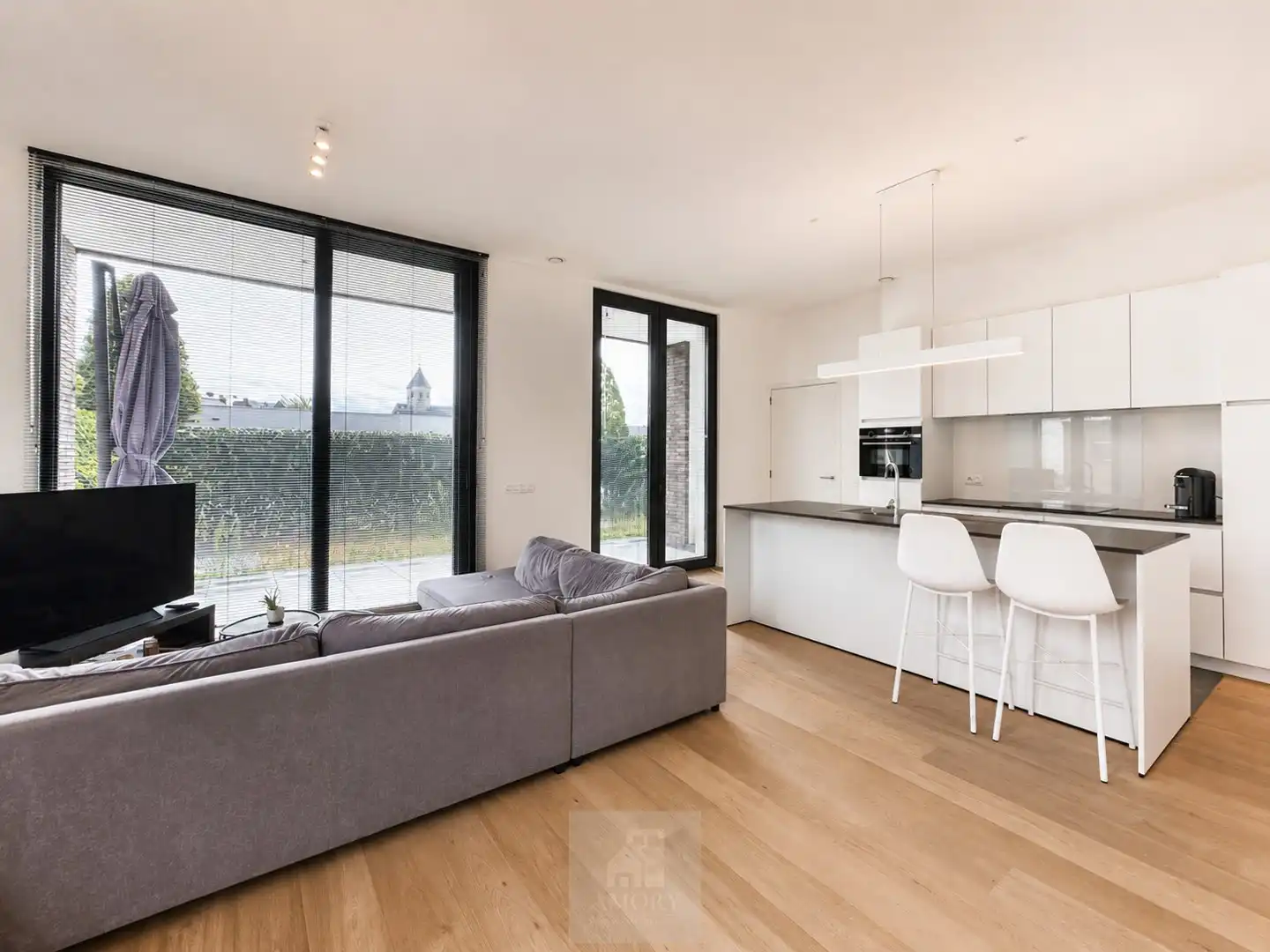 Recent gelijkvloers 2-slaapkamerappartement met tuin aan de Leieboorden foto 2
