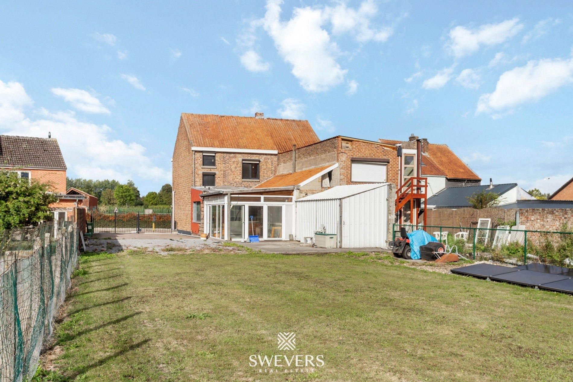 Ideale gezinswoning, instapklaar met ruime tuin en bouwgrond foto 28