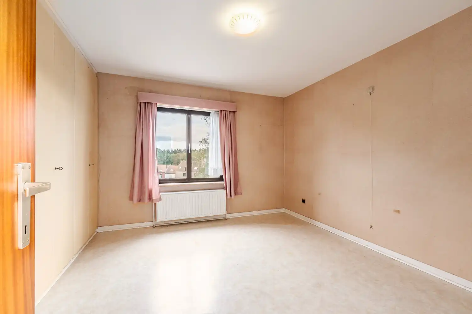 Appartement met 2 slaapkamers, garage, terras en kelder op centrale ligging foto 10