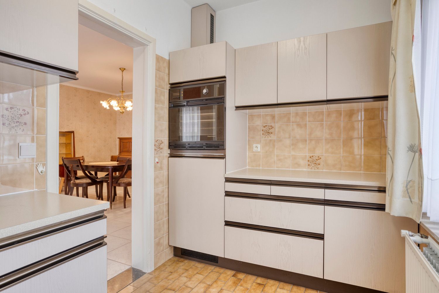 Te renoveren gelijkvloers appartement met 2 slaapkamers en tuin! foto 14
