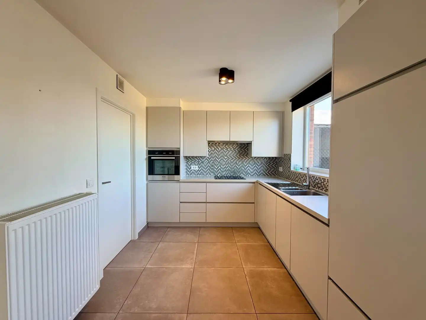 Ideale starterswoning in rustige woonwijk te Ledegem! foto 3