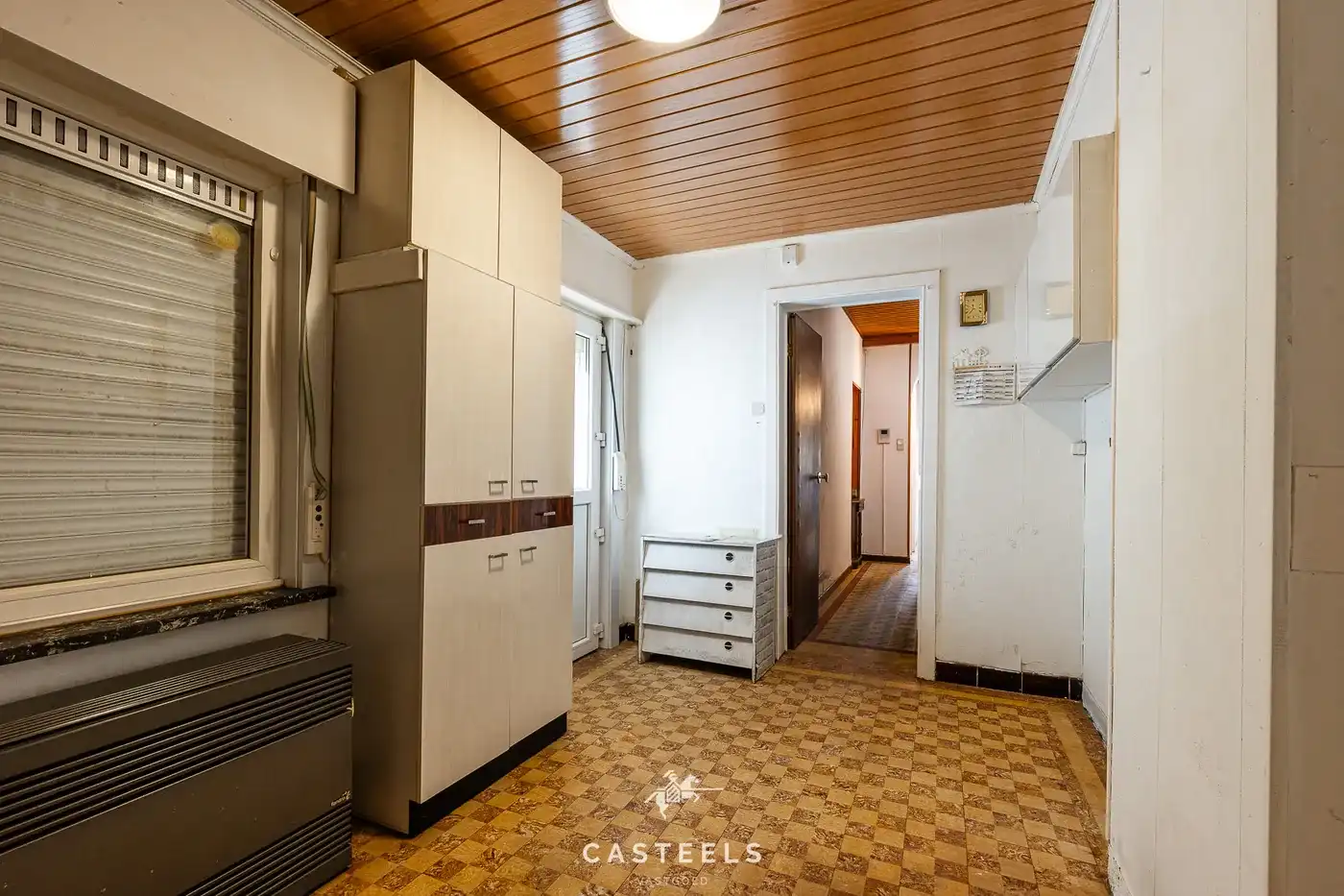 Te renoveren woning met ruime tuin in Merelbeke Flora foto 7