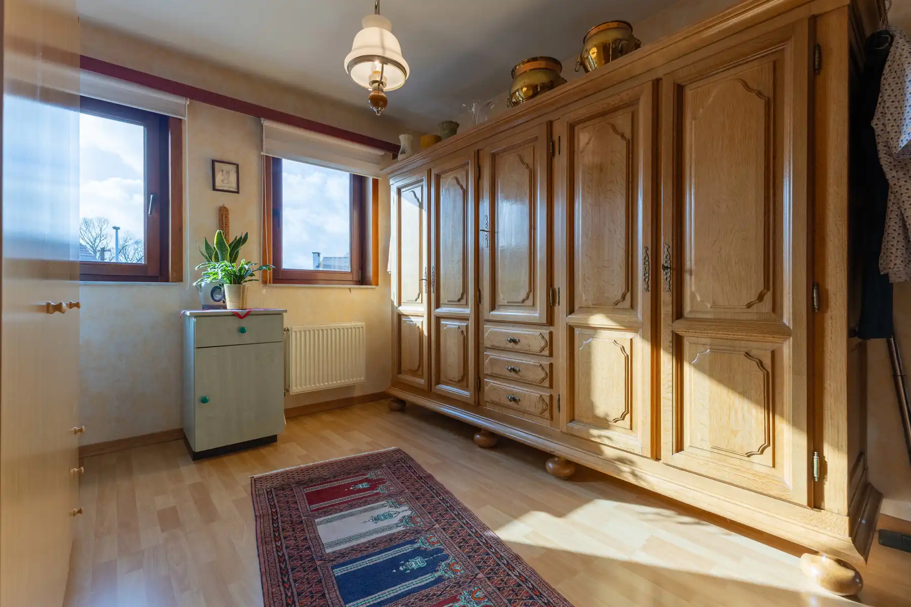 Goed onderhouden woning met prachtige tuin foto 17