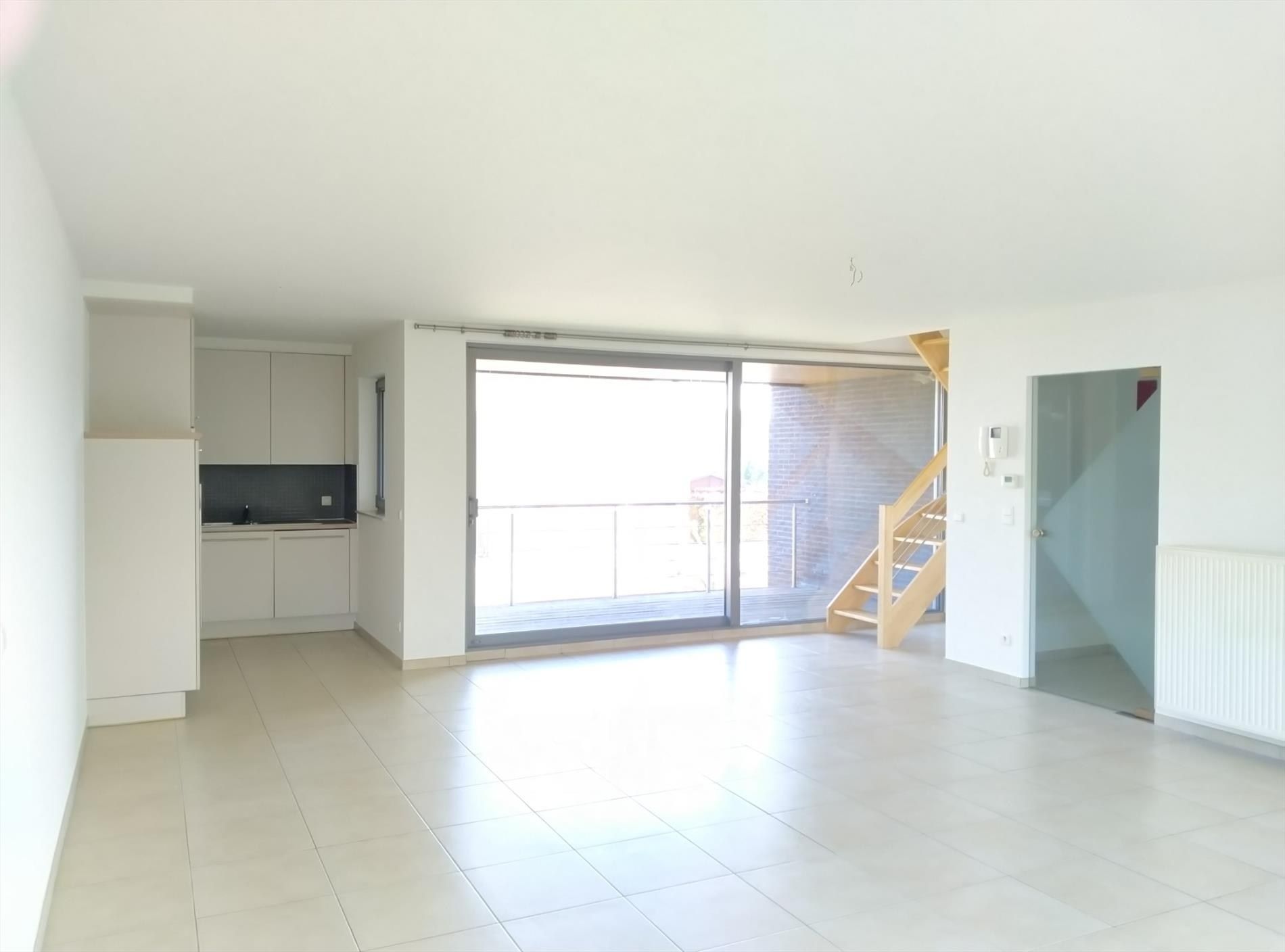 ruim duplex-dakappartement met ondergrondse parking foto 3