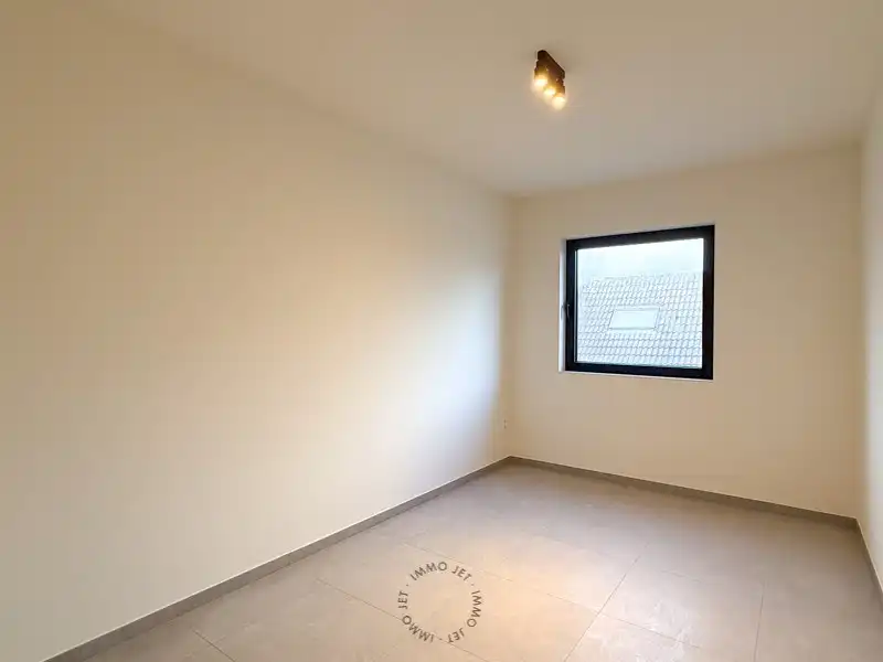 Lichtrijk nieuwbouwappartement met twee slaapkamers, terras en autostaanplaats foto 15