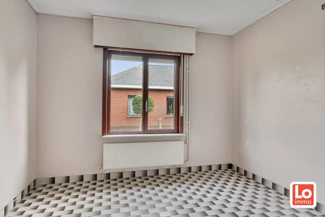 VERKOCHT! Degelijke open gelijkvloerse bebouwing met inpandige garage op een toplocatie in Lochristi! foto 15