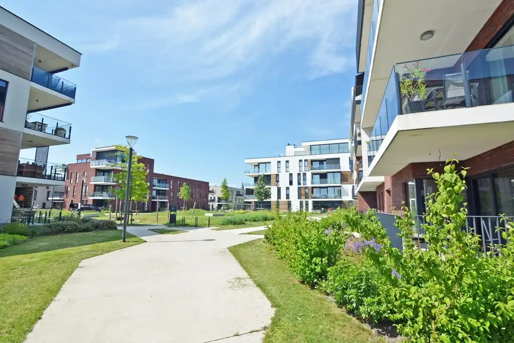 Modern, energiezuinig appartement met 2 slpks, terras, autostaanplaats en kelderberging. foto 20