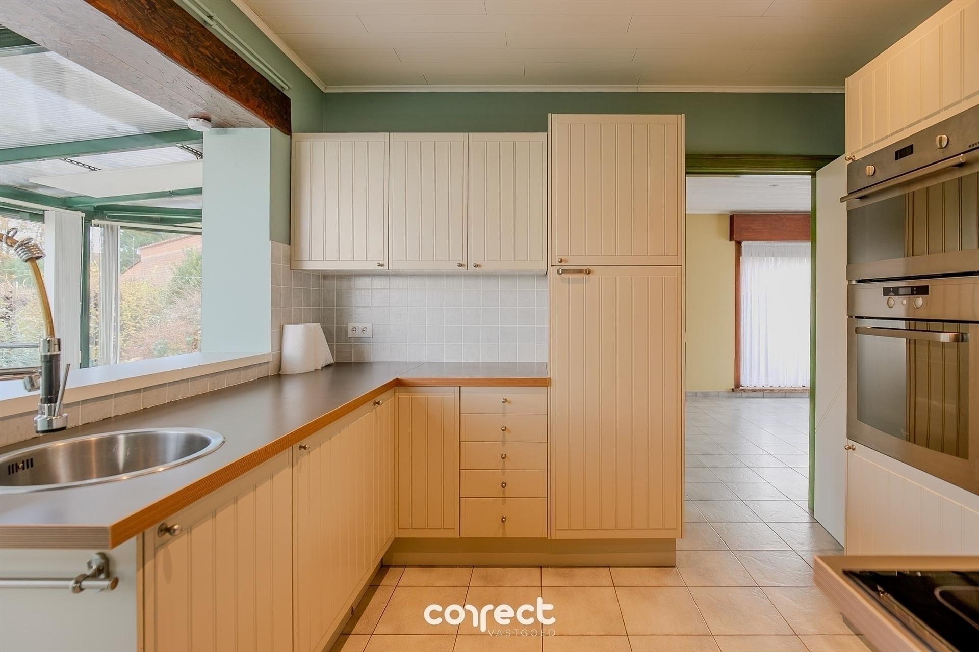 Instapklare open bebouwing met garage, ruime tuin met werkplaats/stallingen. foto 5