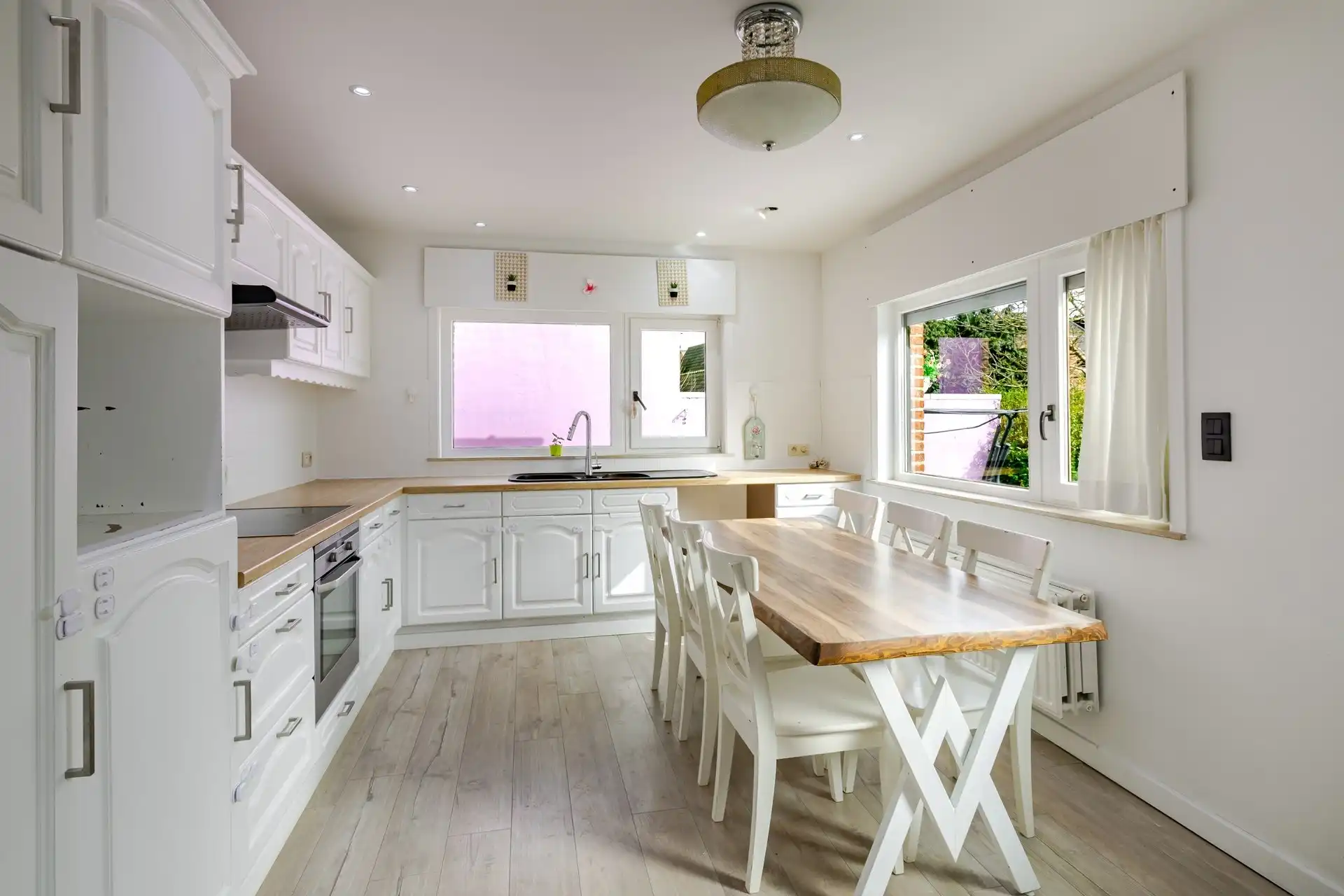 Instapklare woning met 4 slks, garage en aanpalende bouwgrond foto 7