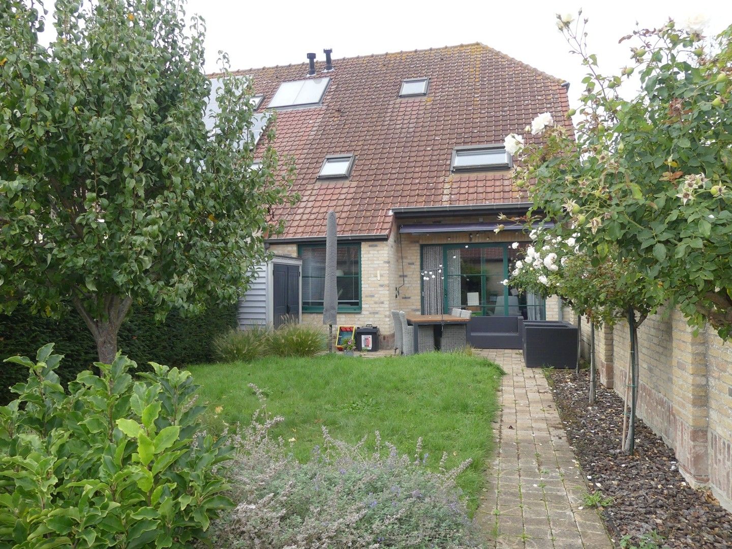 Gezellige stadswoning met tuin en garage foto 12