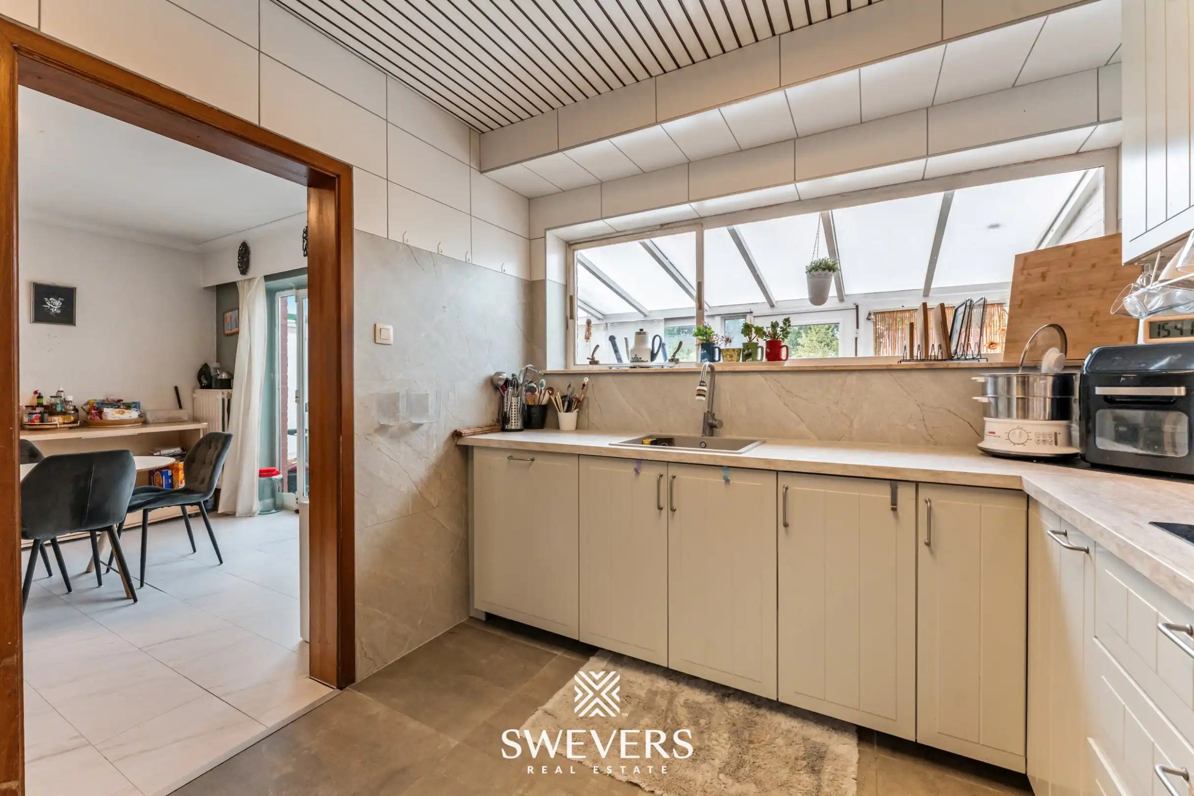 Ruime split-levelwoning op rustige locatie in Diepenbeek (mogelijkheid tot 2 HOB) foto 6