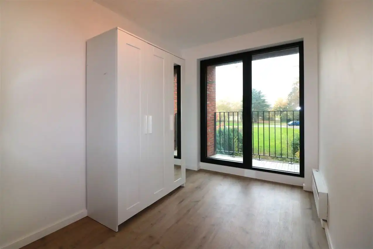 Appartement met 2 slpk, terras, tuin en autostaanplaats foto 16