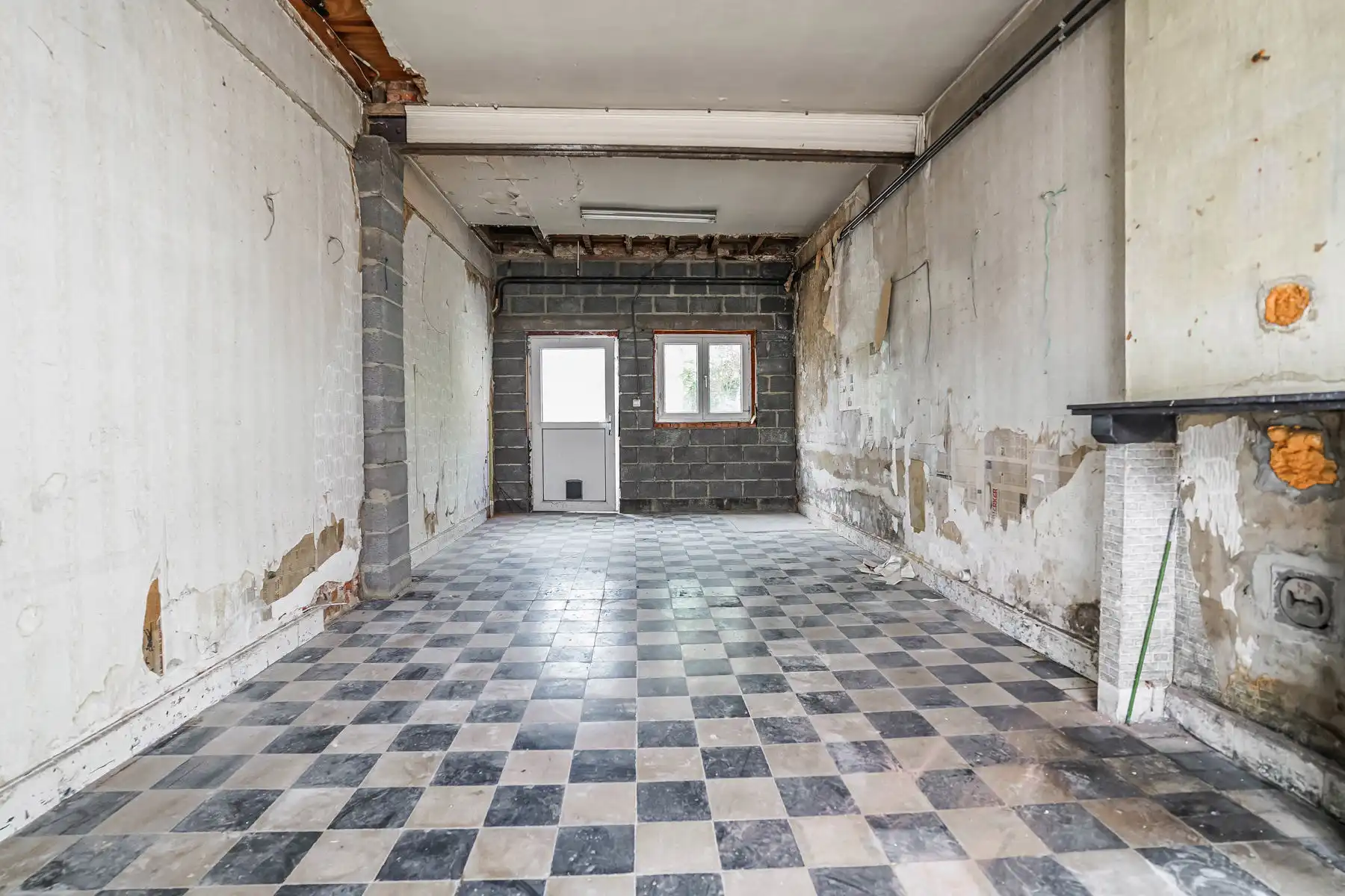 Te renoveren woning met tuin in centrum Londerzeel foto 11
