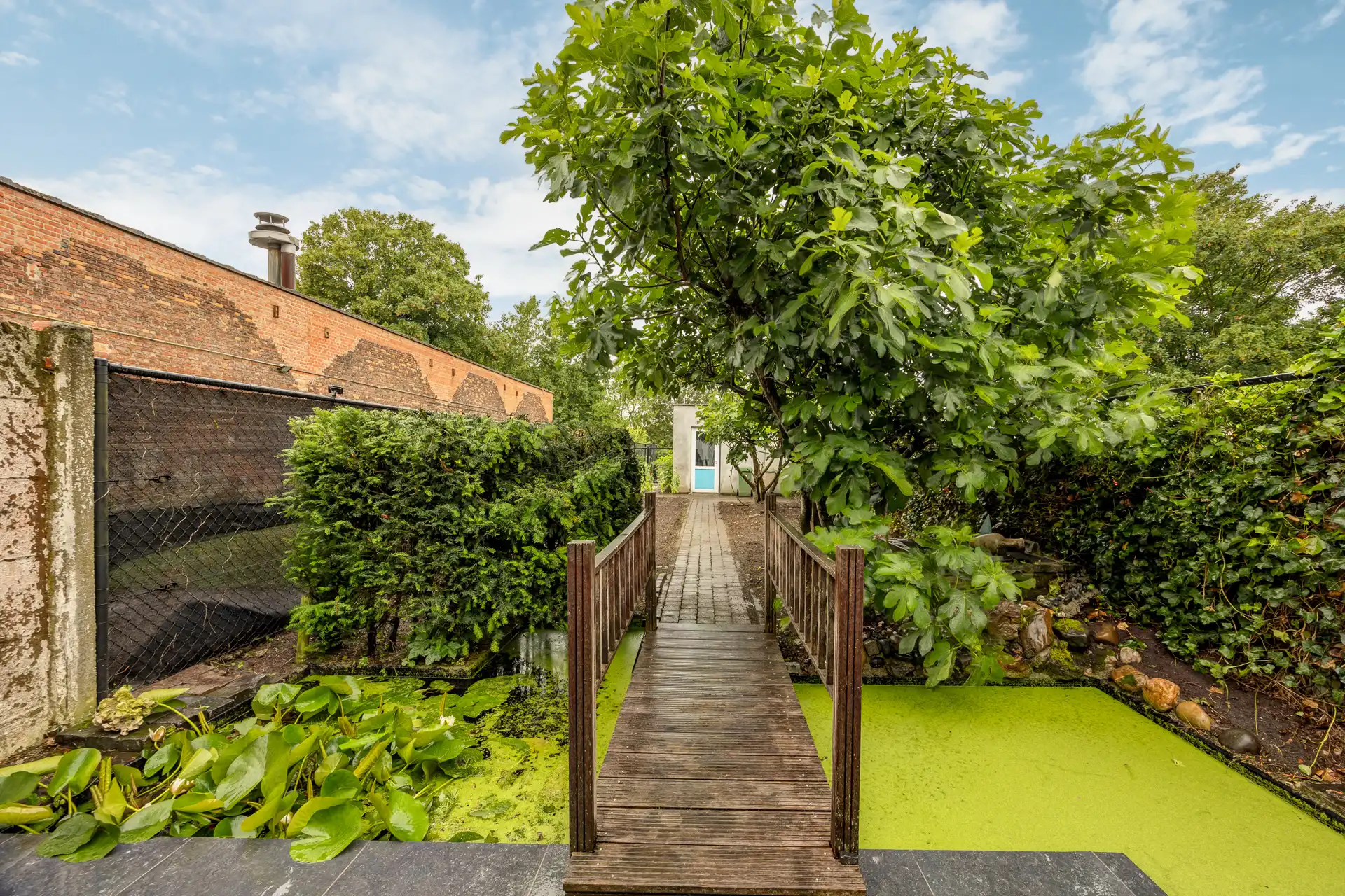 Zeer ruime woning met oprit, garage, terras en grote tuin! foto 20