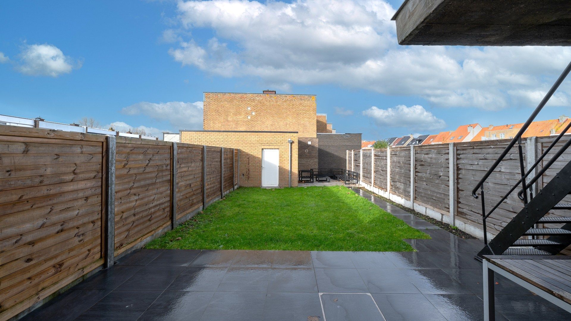 Halfopen woning met 2 garages en tuin te Heist foto 10