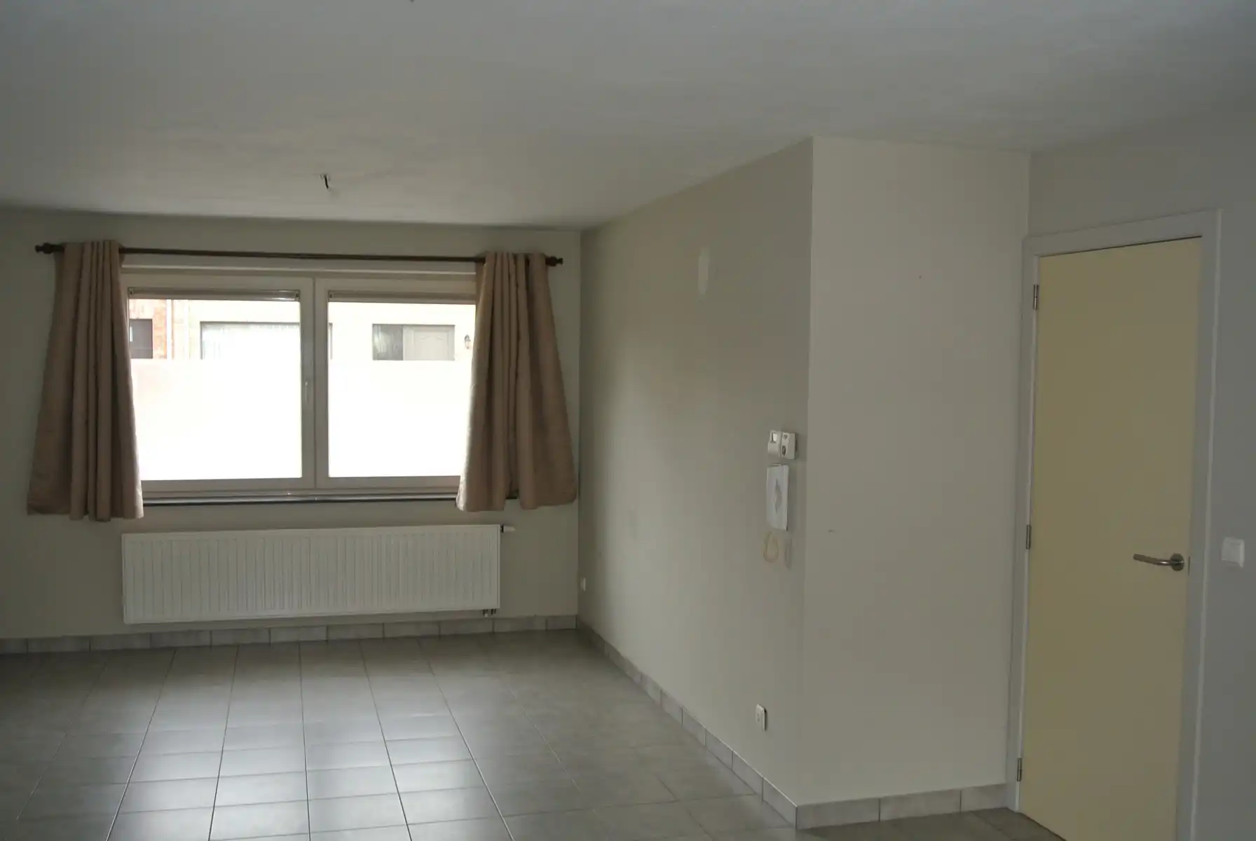 Gezellige gelijkvloers appartement  met 2 slaapkamers + terras en tuintje foto 4