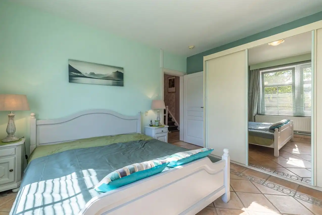 Karaktervolle en instapklare woning met zonnige tuin nabij het Gras- en Crauwelsbos foto 30