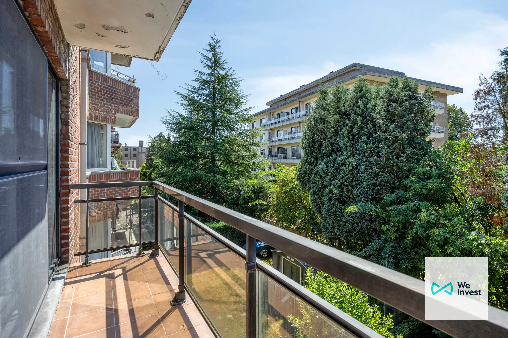 Ruim 2-slaapkamerappartement met balkon en binnenstaanplaats foto 11