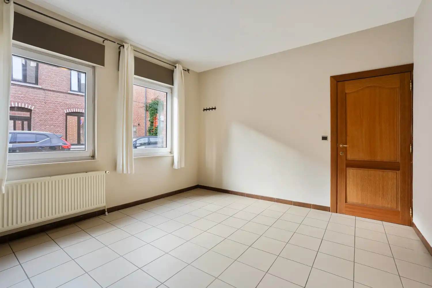 Gelijkvloers appartement met 2 slaapkamers, een ruim terras, 2 autostaanplaatsen, een kelder en een tuin grenzend aan de Vijvers van Bellefroid te Leuven! foto 10