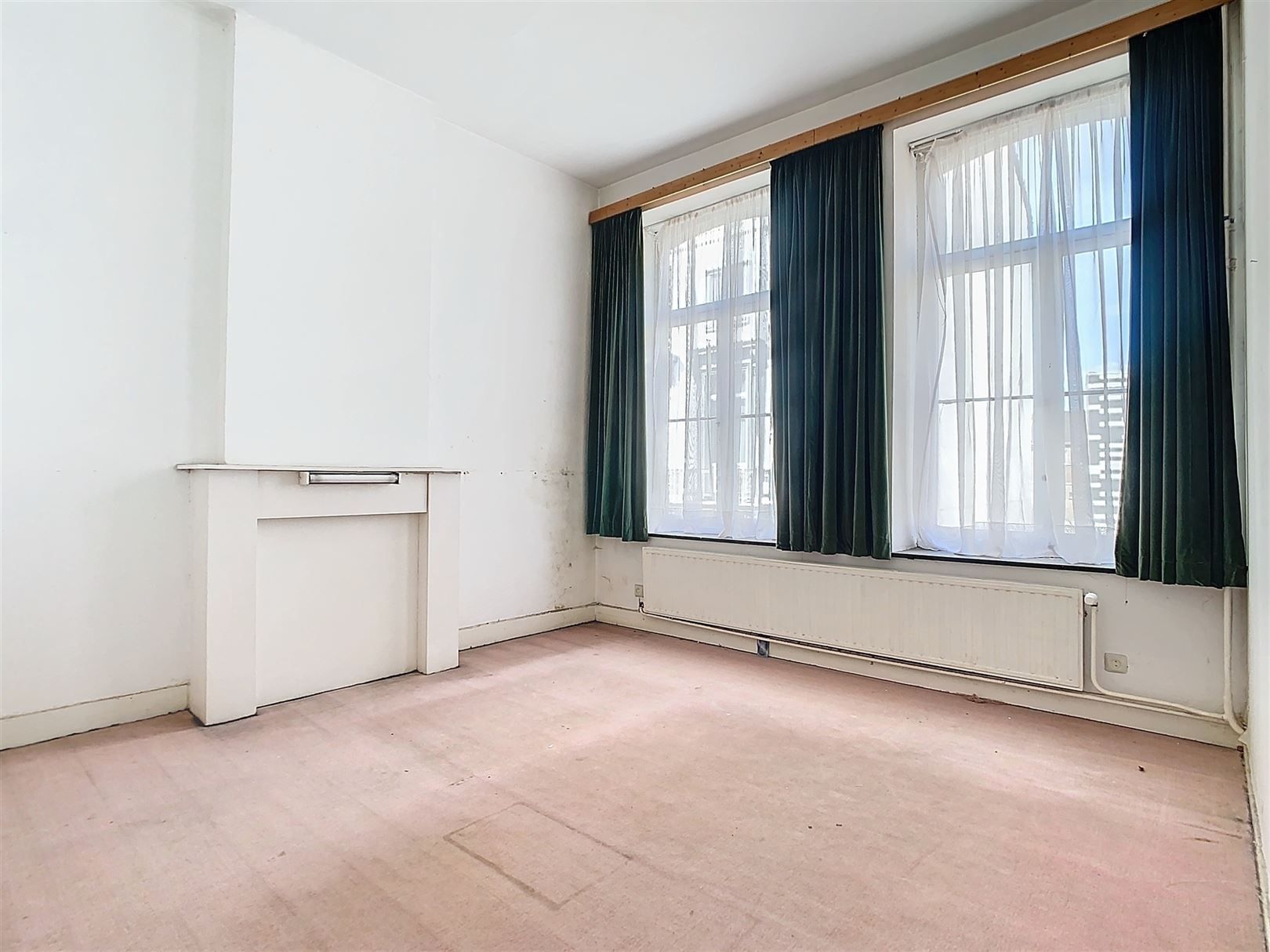 Te renoveren herenwoning +  handelsruimte + 2 garages foto 13