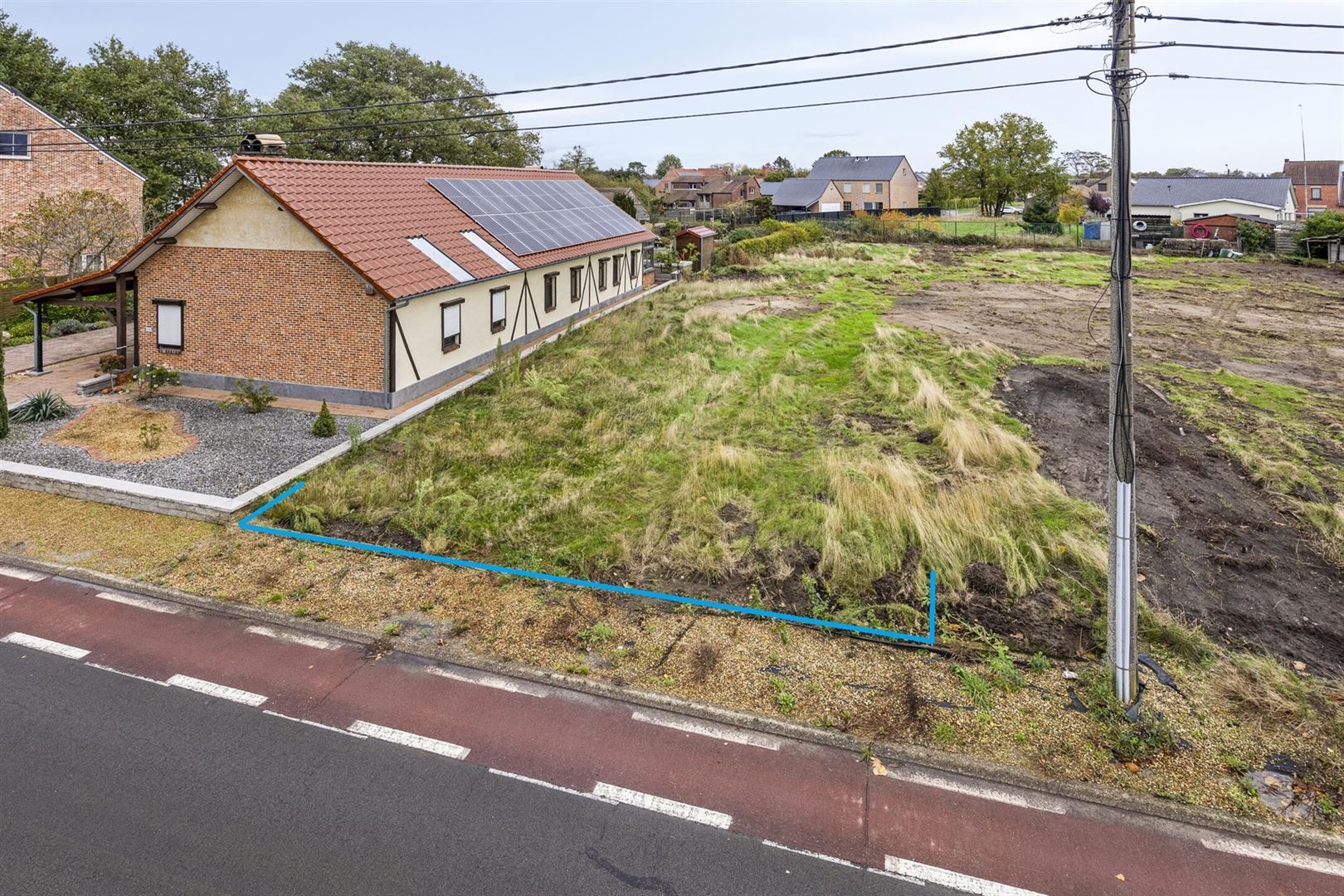 TE KOOP: Bouwgrond voor halfopen bebouwing te Paal!  foto {{pictureIndex}}