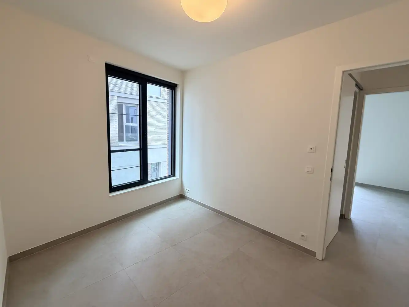 Hoogwaardig afgewerkt nieuwbouwappartement met 2 slaapkamers + kelderberging en staanplaats foto 13