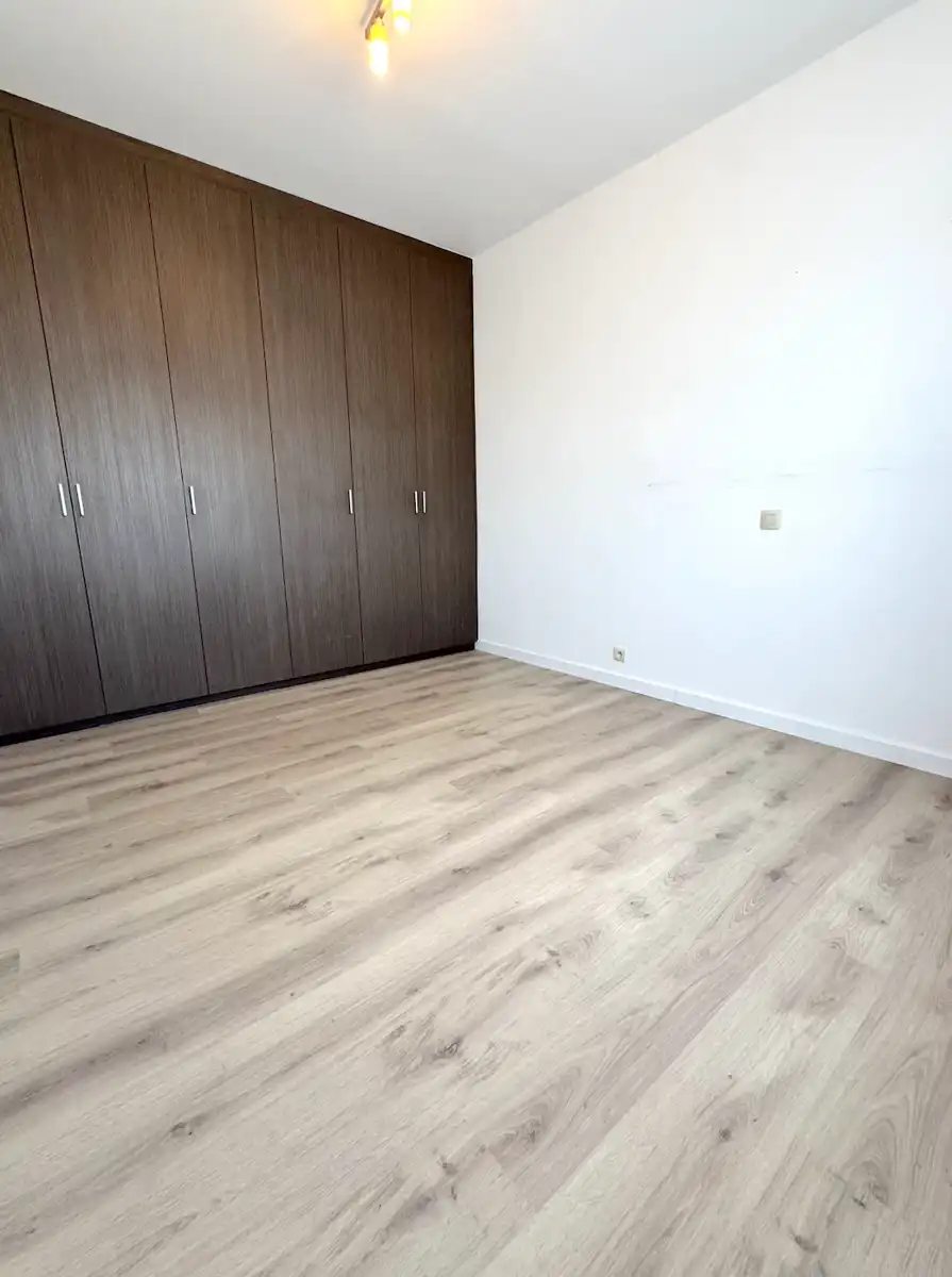 Instapklaar appartement met 2 slaapkamers én garage! foto 17