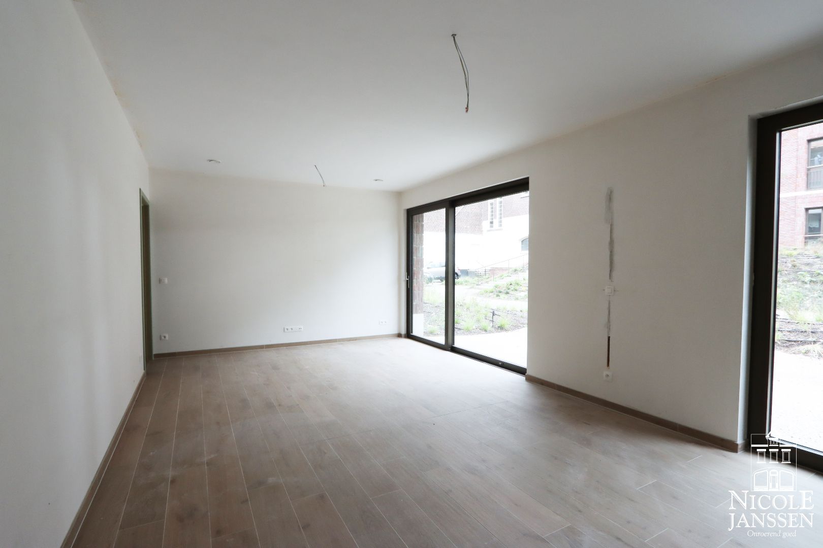 Nieuwbouwappartement met twee slaapkamers en autostandplaats in het centrum van Maaseik foto 2