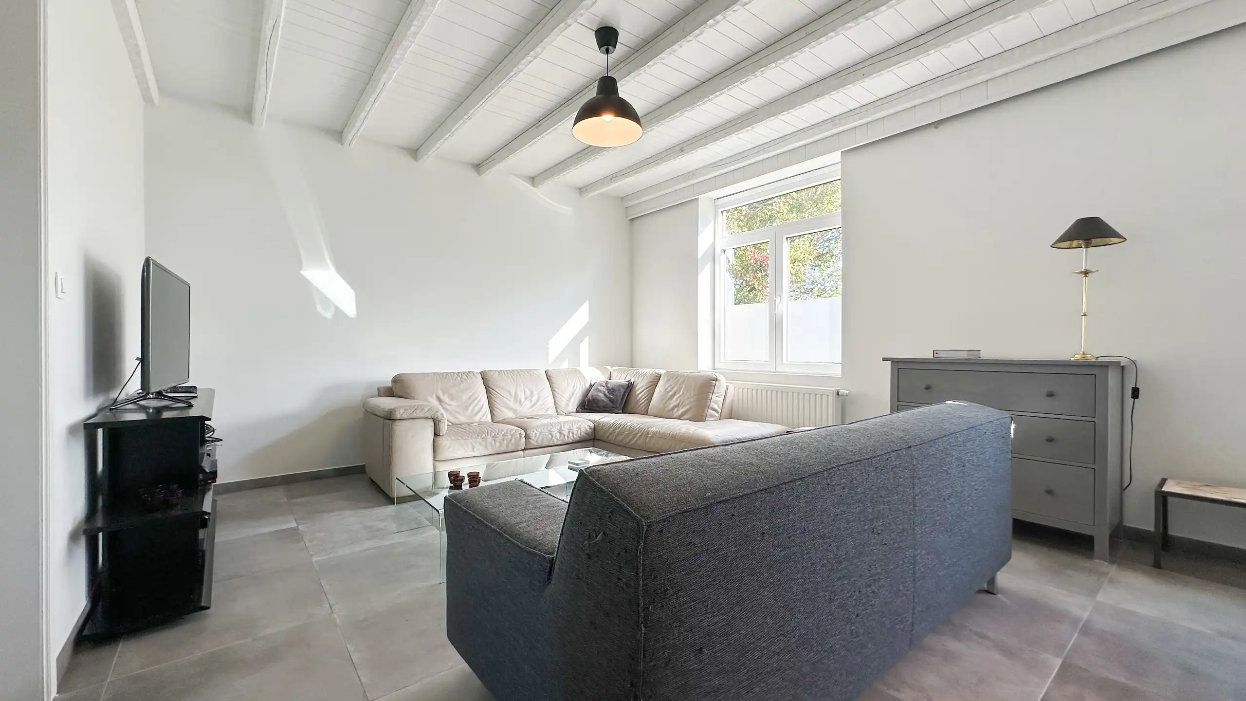 Charmante woning met 2 slaapkamers en een polyvalente ruimte foto 4