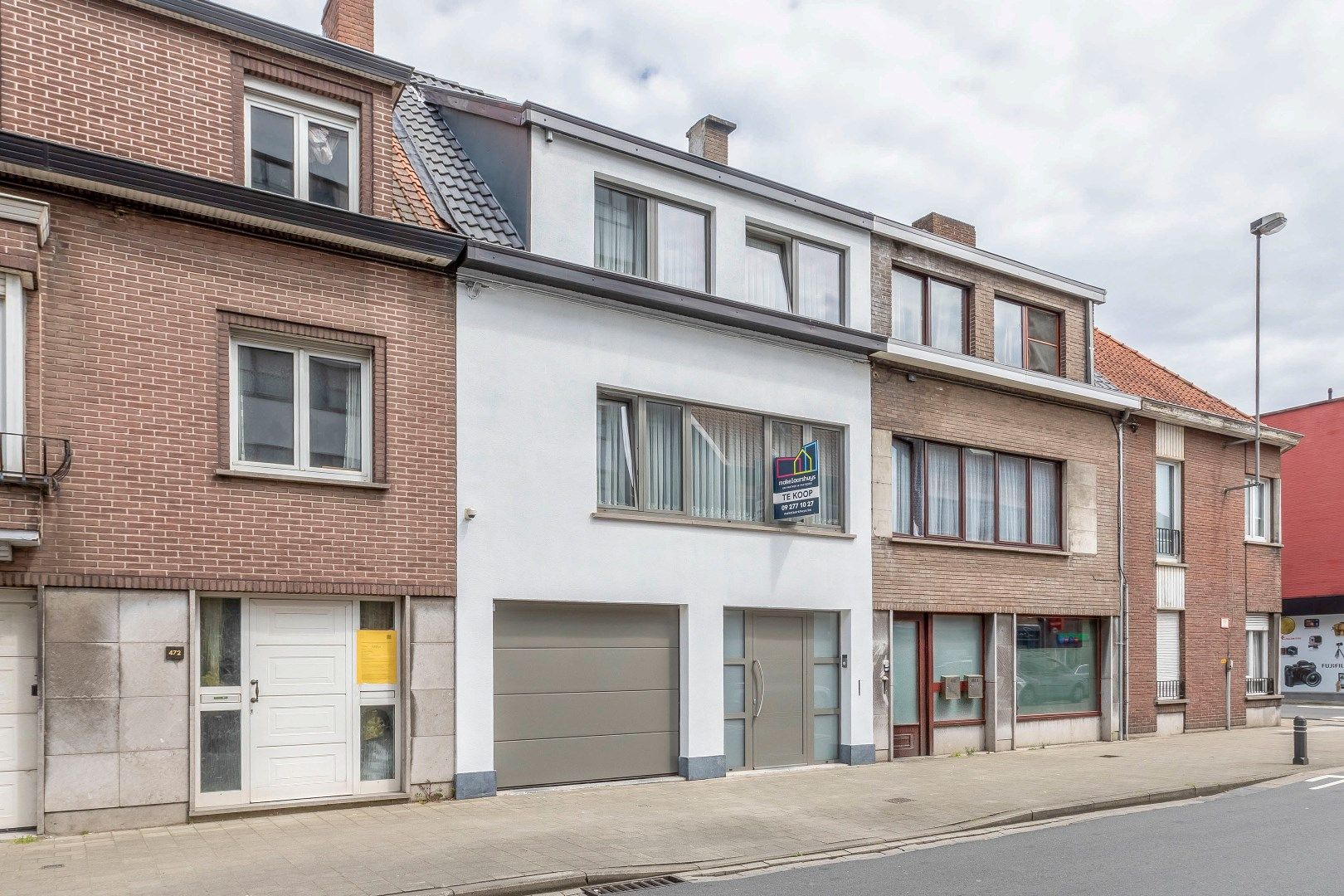 Volledig gerenoveerde woning met garage en terras/koer in het centrum  foto 1