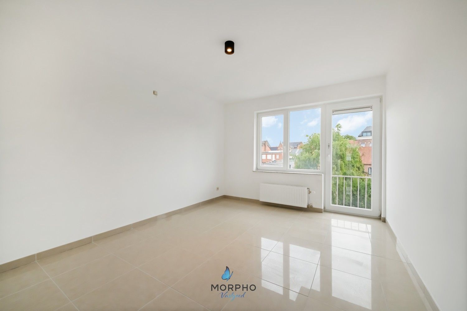 Modern en energiezuinig 2-slaapkamerappartement op de derde verdieping in hartje Temse! foto 9