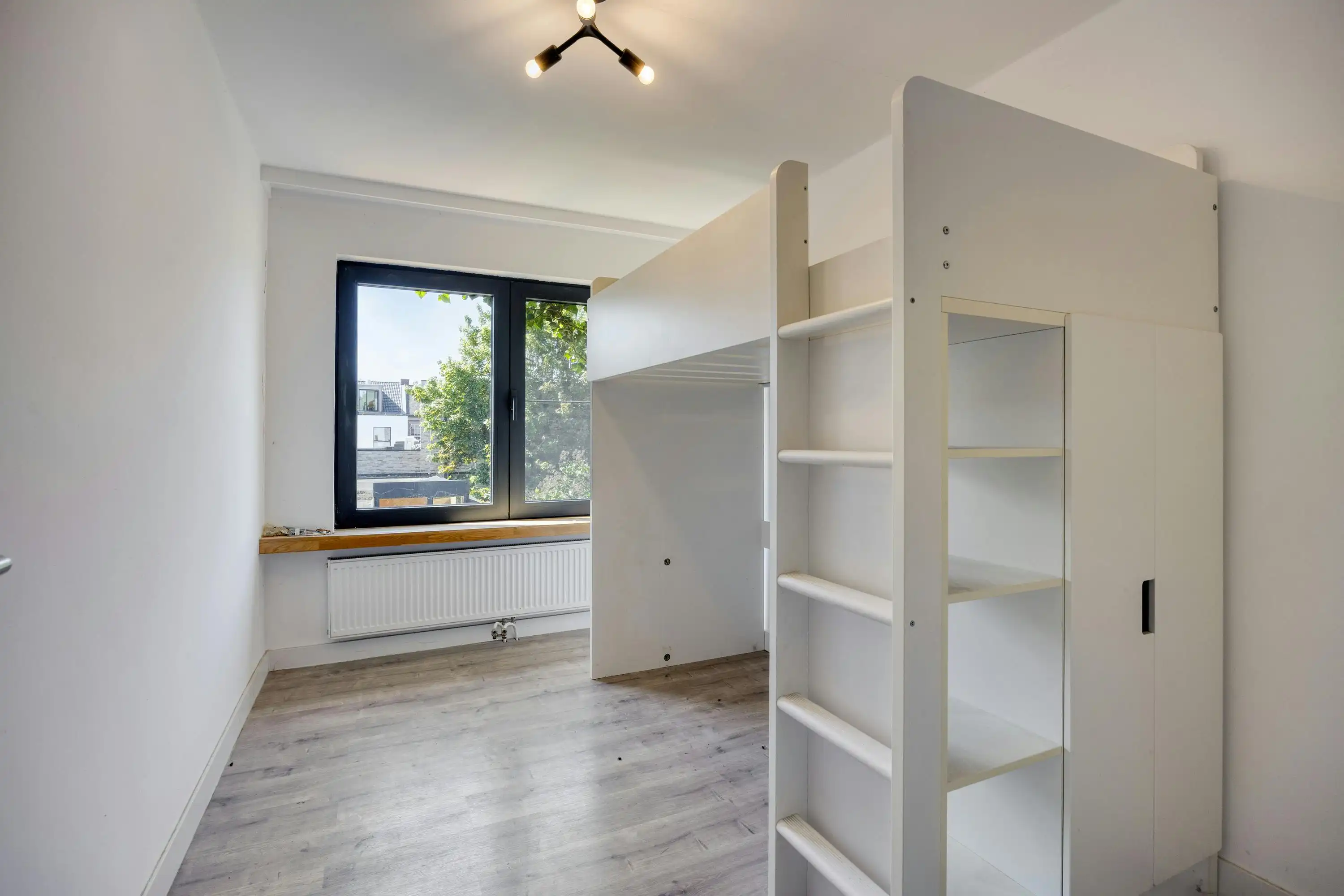 Unieke stadswoning met terras, atelier en garage te koop foto 8