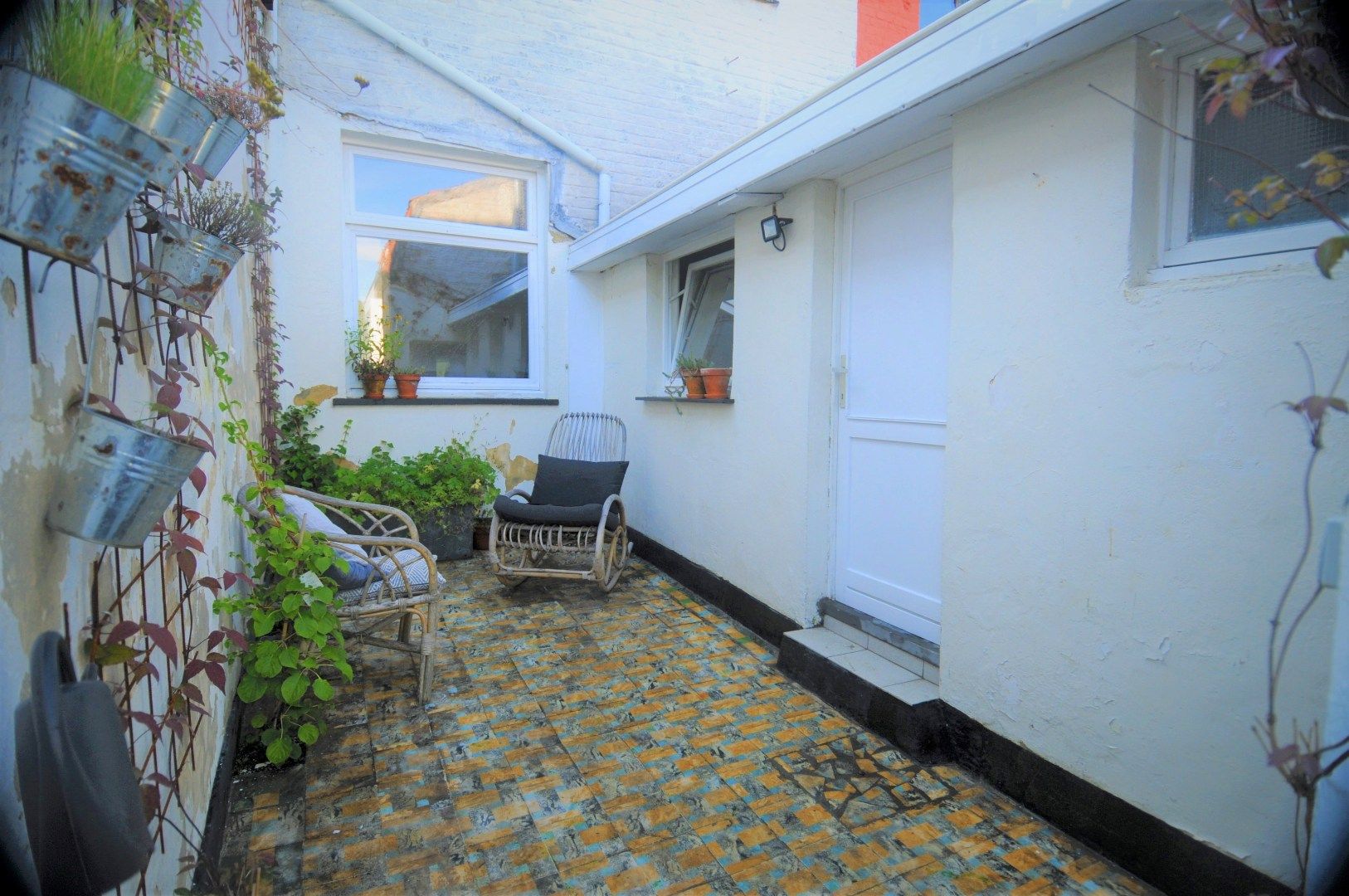 Op te frissen rijwoning met tuin, garage en 2 slaapkamers te Marke foto 13