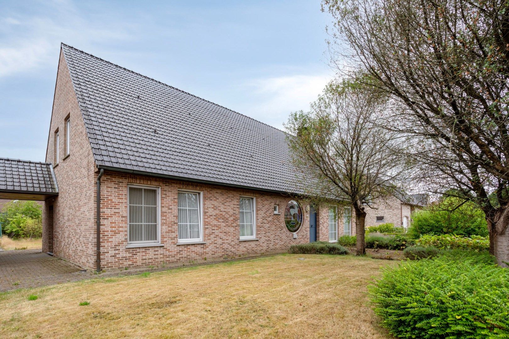 Hoofdfoto van de publicatie: Ruime woning met 3 slaapkamers op een perceel van 1.880 m² te Olen-Centrum !