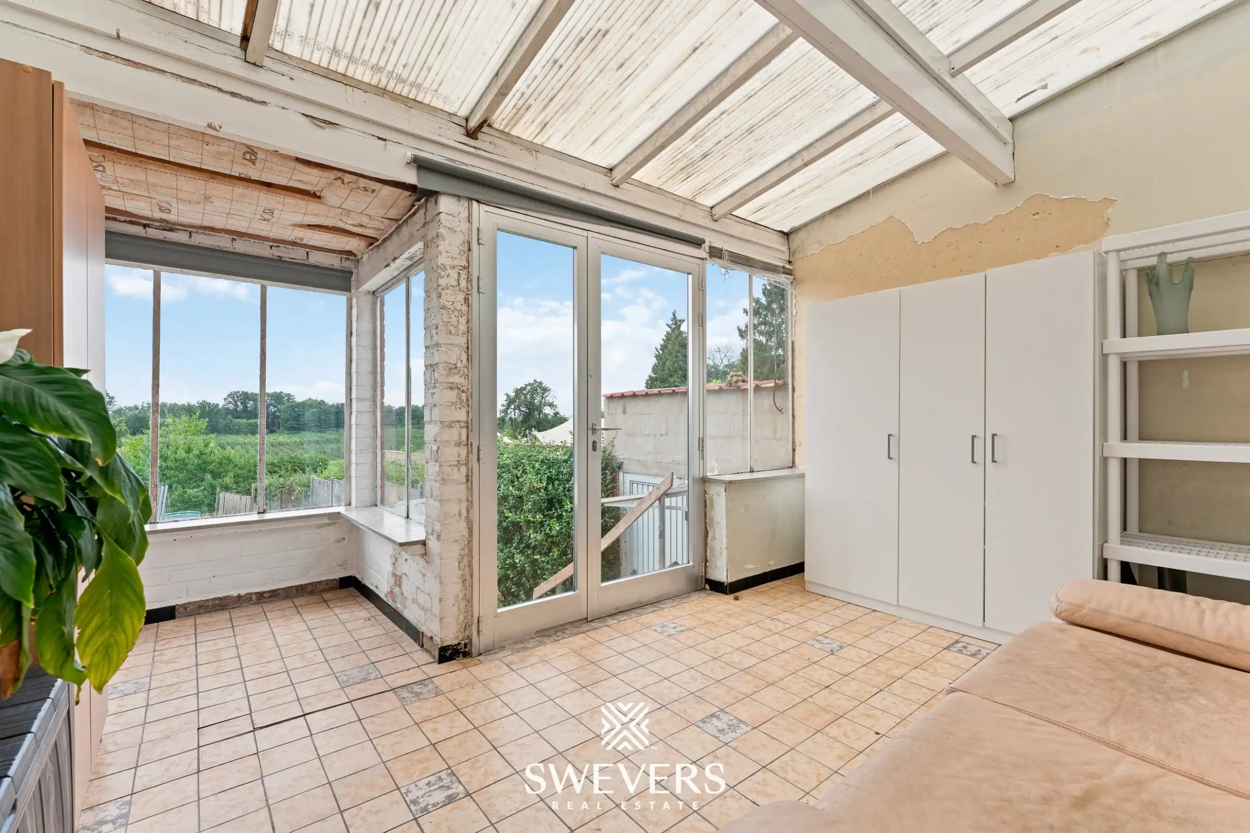 Instapklare woning met zonnige tuin in Borgloon foto 15
