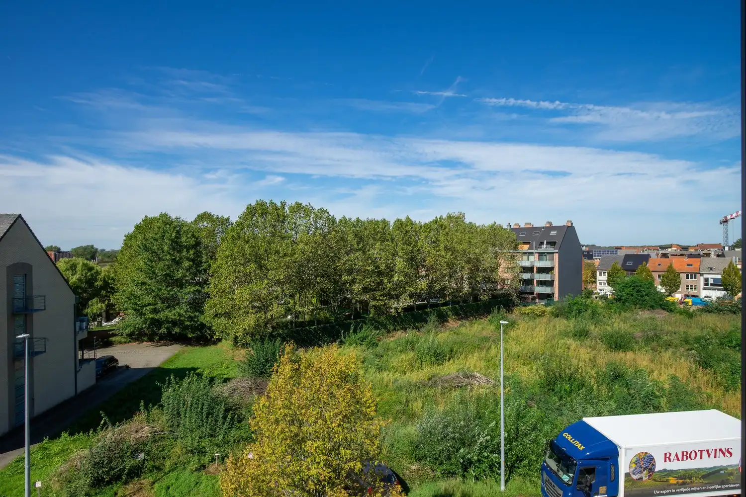 Energiezuinig dakappartement met 1 slaapkamer, aparte dressing/bureau, terras en ondergrondse staanplaats in Residentie Luster foto 14