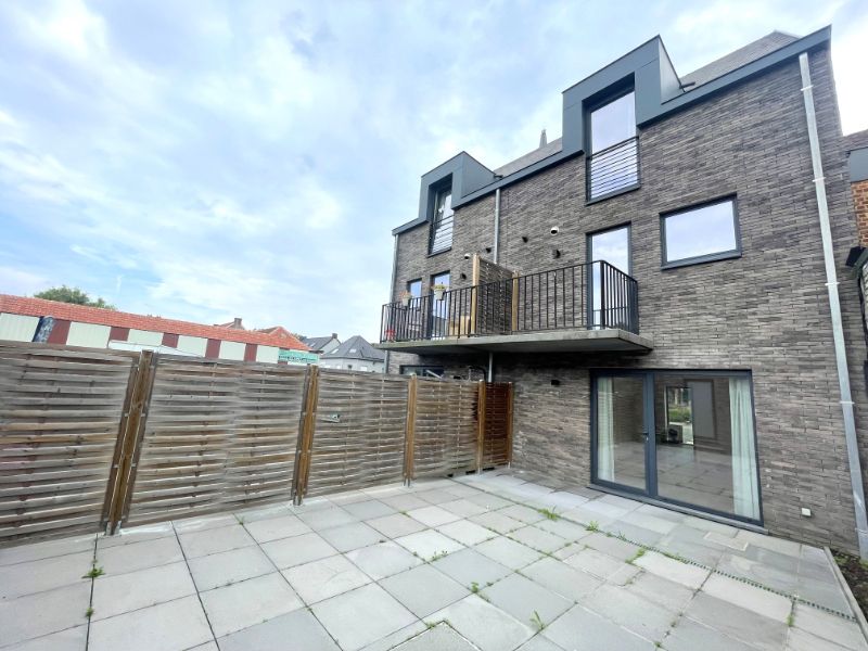 Instapklare woning met terras en garage in hartje Aspelare foto 2