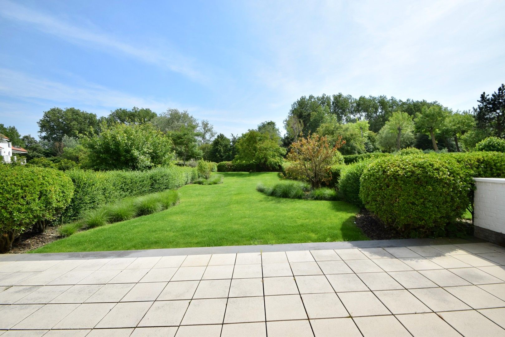 Zonovergoten tuin appartement met groot terras en prachtige tuin gelegen in het exclusieve domein Tennis Gardens. foto 9