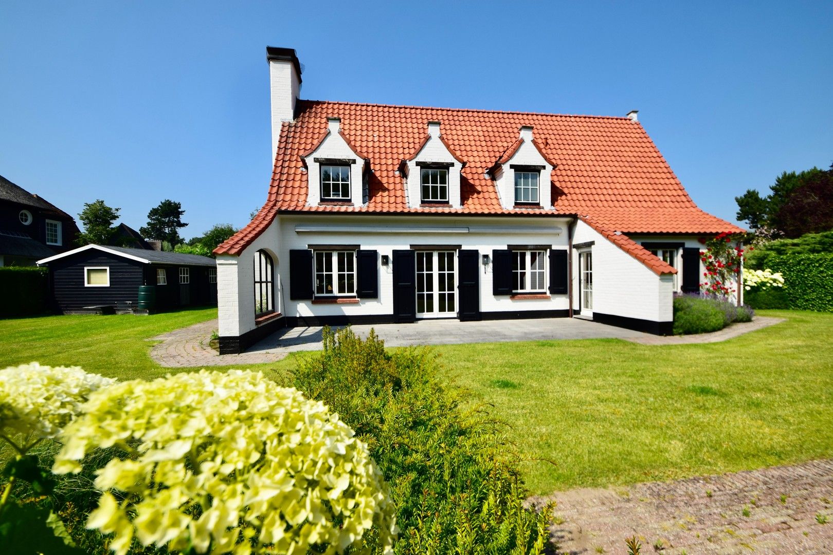 Alleenstaande villa nabij de Magere Schorre en de Kalfmolen, genietend van groene zichten. foto 1