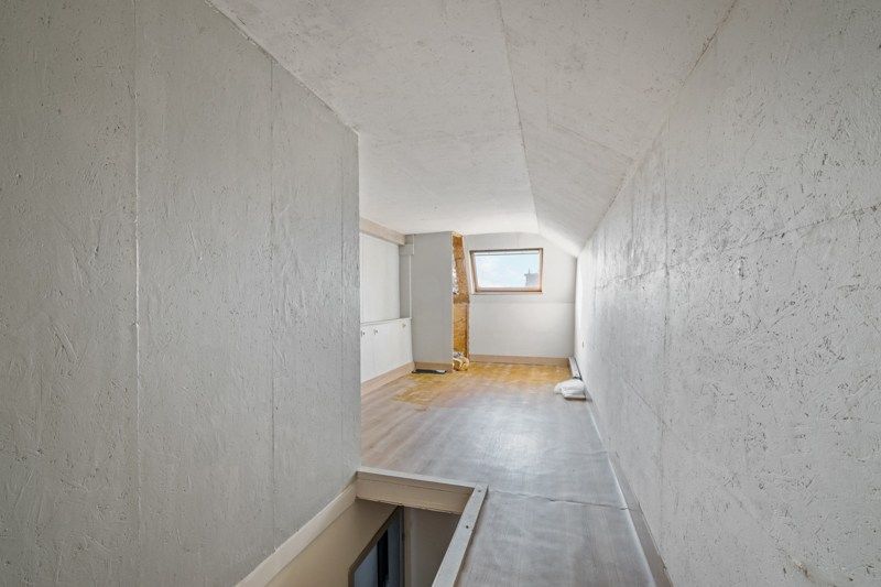 Instapklare bel-etagewoning met garage, tuin en veel potentieel foto 15