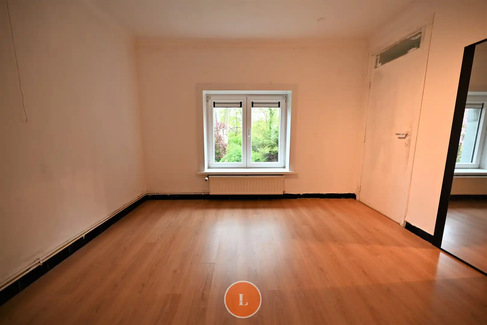 Opbrengsteigendom met 2 appartementen en 2 garages foto 5