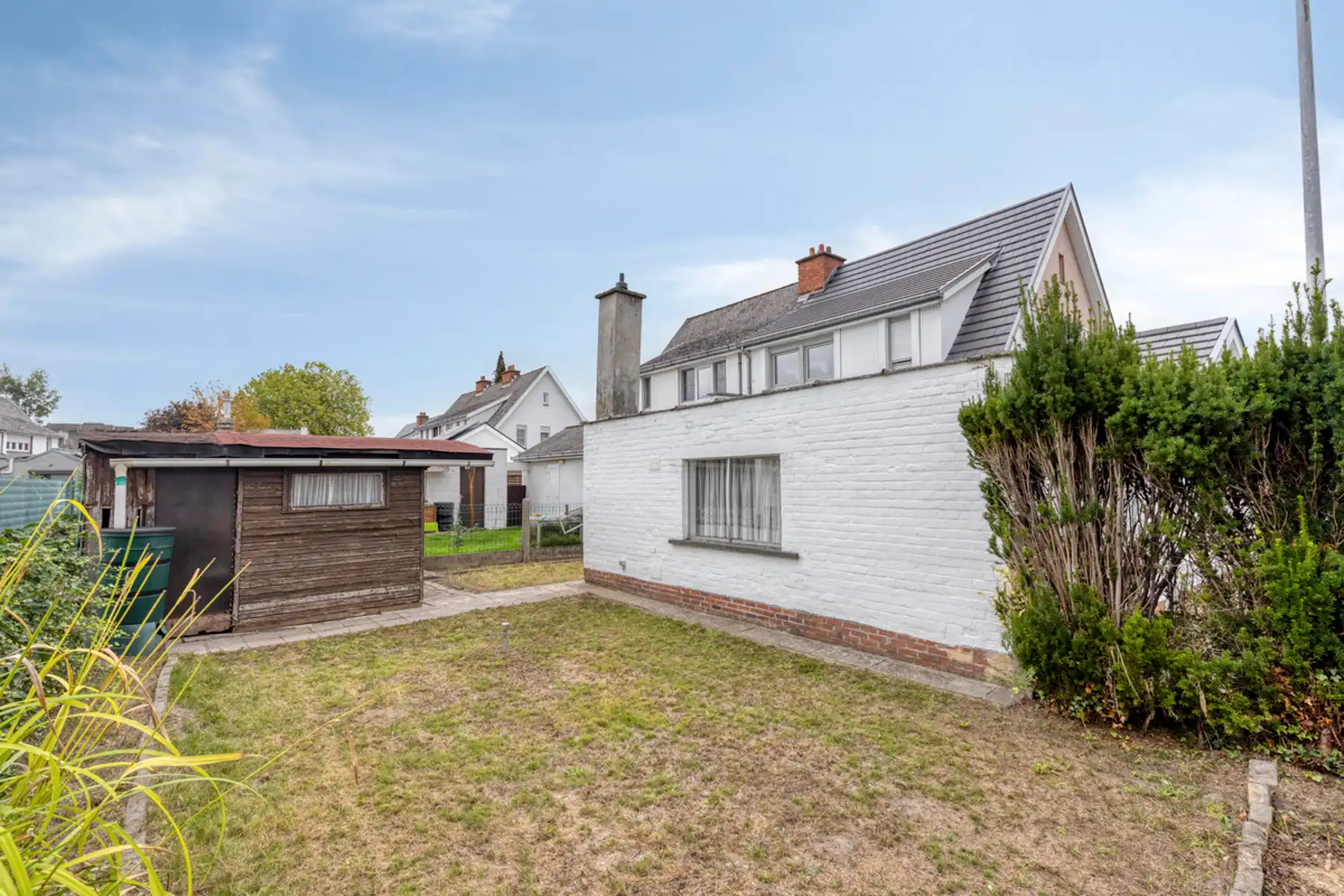 Instapklare centrum-woning pal bij centrum Buggenhout  foto 31