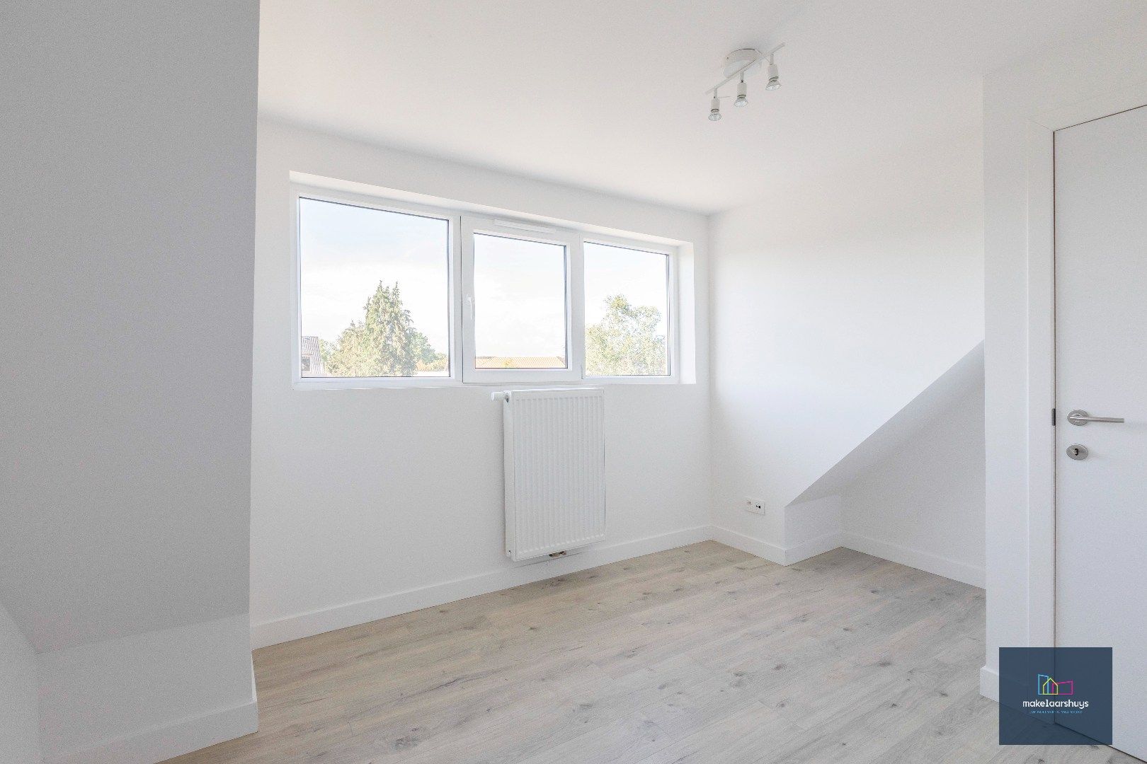 Instapklare energiezuinige woning met 3slpk tuin en staanplaats foto 17