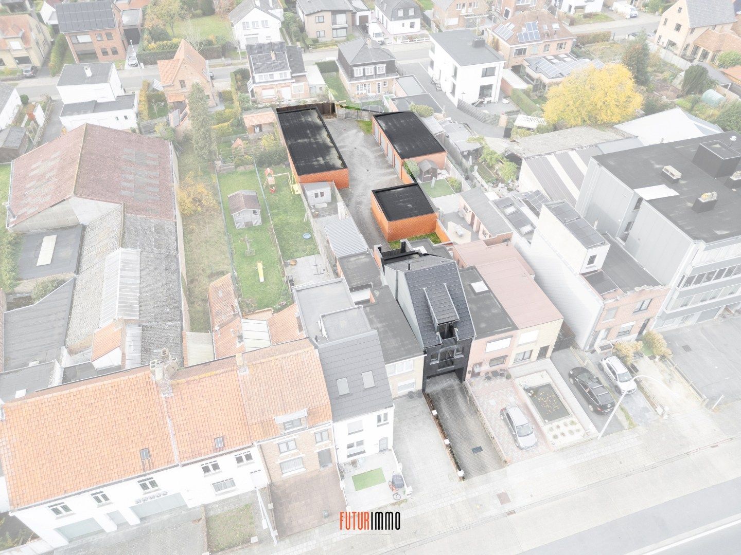 Opbrengsteigendom: duplexappartement + 12 garages foto 2