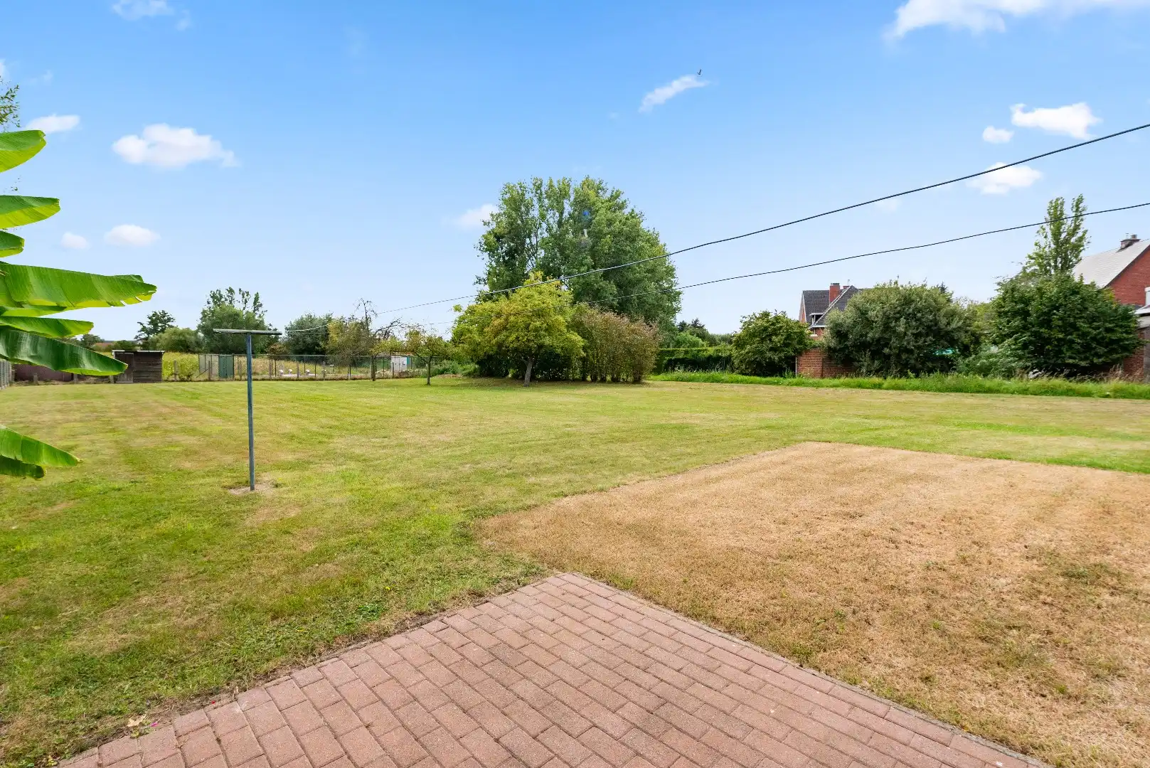 Open bebouwing op topligging met 3 slaapkamers en prachtige tuin foto 27