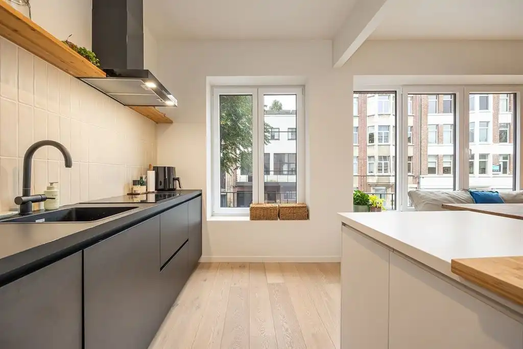 Instapklaar appartement met ruime tuin foto 6