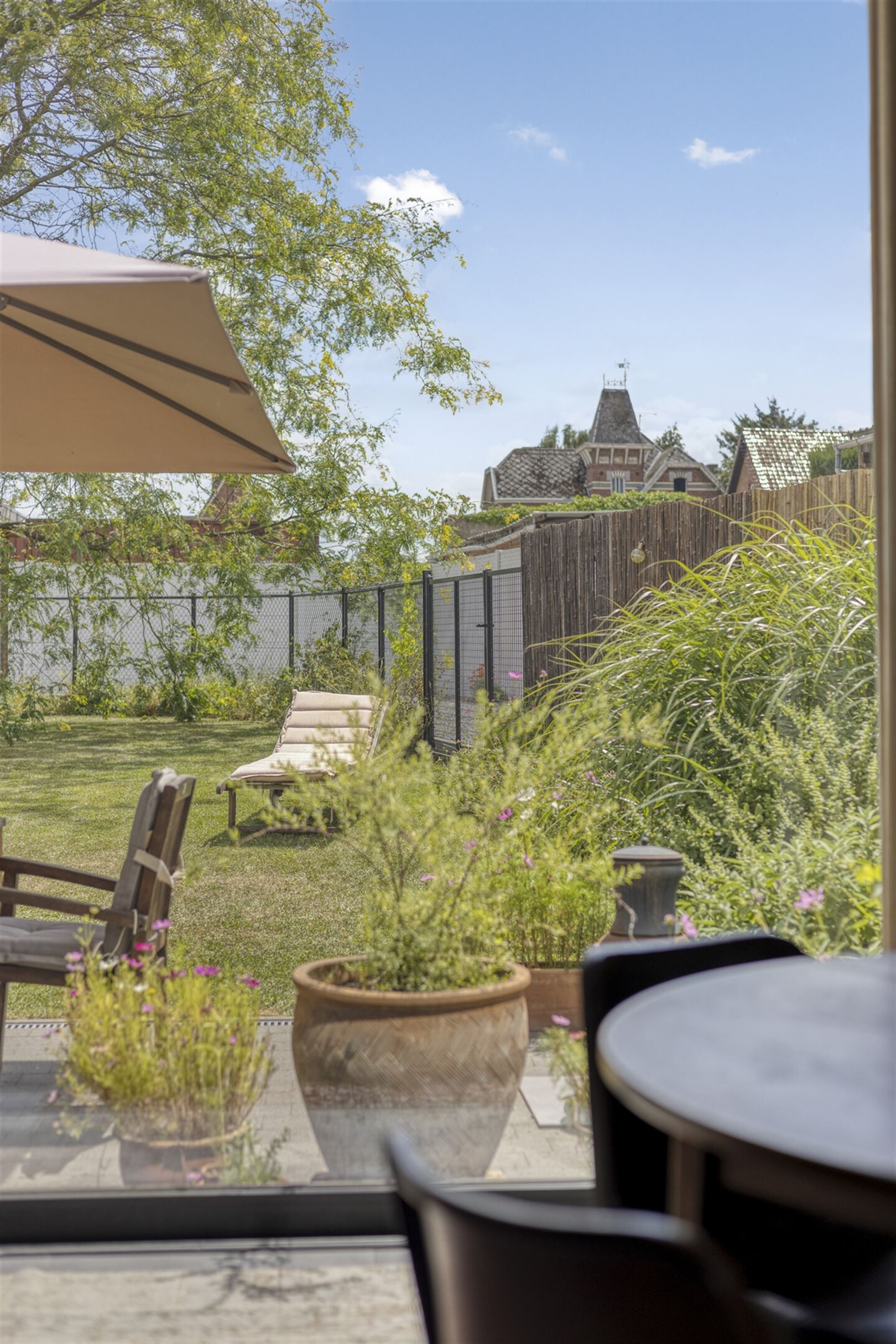 TE KOOP: Recente halfopen woning met tuin in Hoepertingen! foto 12