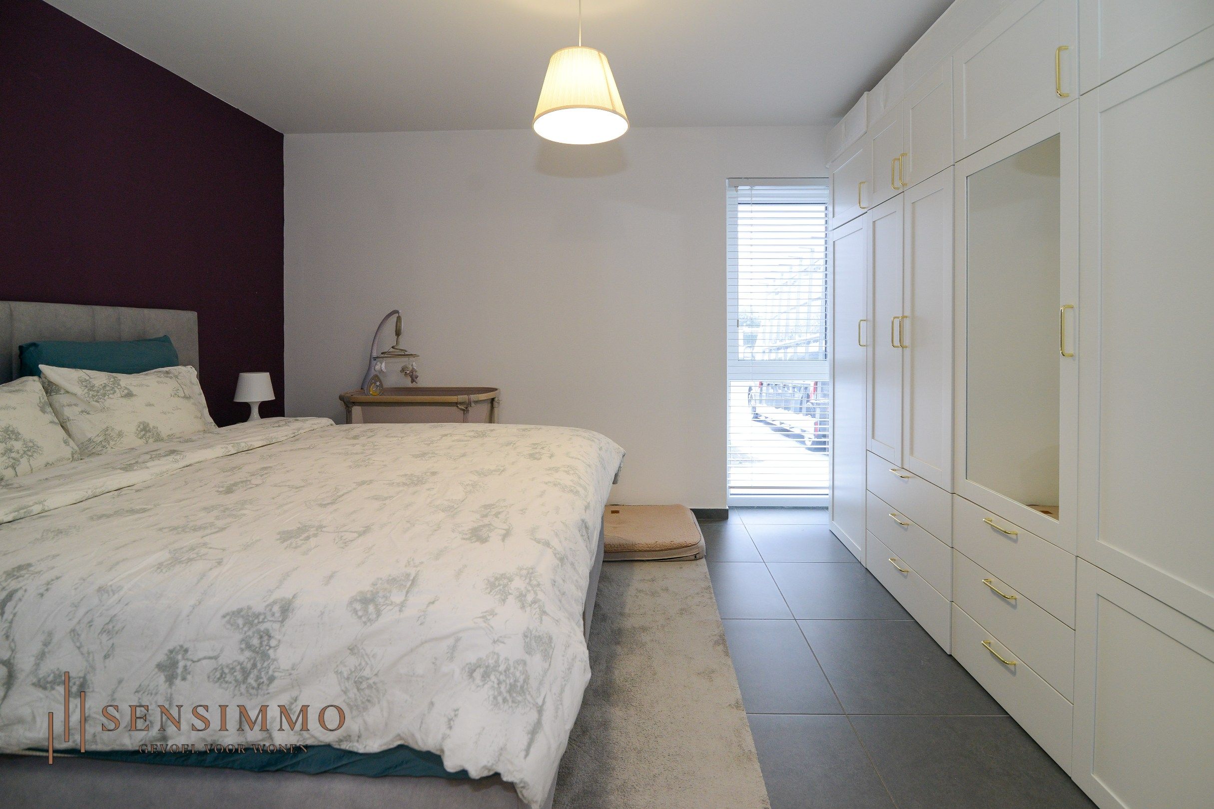 Gelijkvloers tweeslaapkamerappartement met tuin, parking en kelderberging foto 16