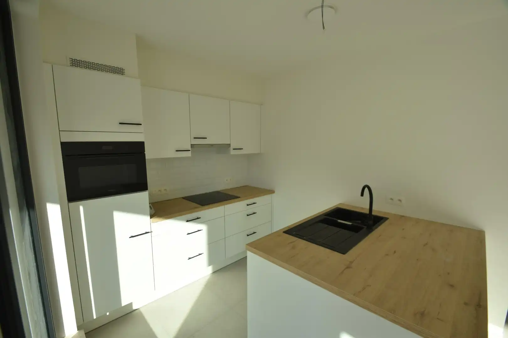 Modern ingericht appartement aan rand van centrum foto 9